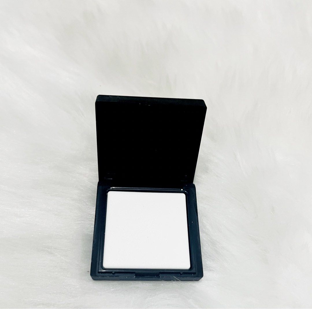 NARS Light Reflecting Setting Powder Pressed Mini (Category: Makeup) located in Quezon City. Submitted by klawdeclutteeeeerr (Listing ID 1422819768, Image 2). Description: - NARS Light Reflecting Setting Powder (Mini) - Pressed powder formula - Compact and travel-friendly size - Sleek black compact design -BNEW WITH BOX-800 BNEW WITHOUT BOX-700.