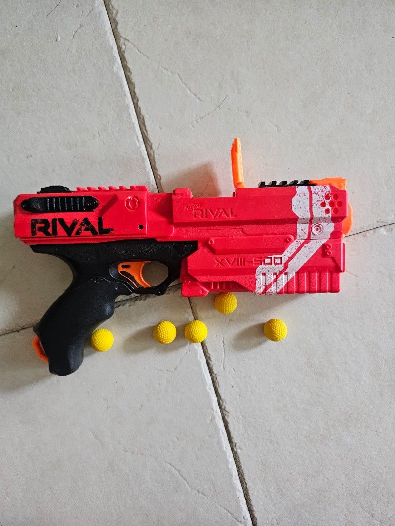 Nerf Rival Kronos XVIII-500 blaster red (Category: Toys & Games) located in Singapore. Submitted by xxiaollongbbao (Listing ID 1422742991, Image 2). Description: - Nerf Rival XVIII-500 - Includes 5 yellow foam balls - Almost brand new used for like a week - No damages as of what i see.