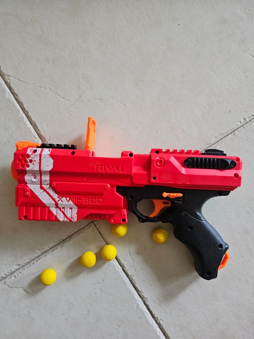 Nerf Rival Kronos XVIII-500 blaster red (Category: Toys & Games) located in Singapore. Submitted by xxiaollongbbao (Listing ID 1422742991, Image 3). Description: - Nerf Rival XVIII-500 - Includes 5 yellow foam balls - Almost brand new used for like a week - No damages as of what i see.