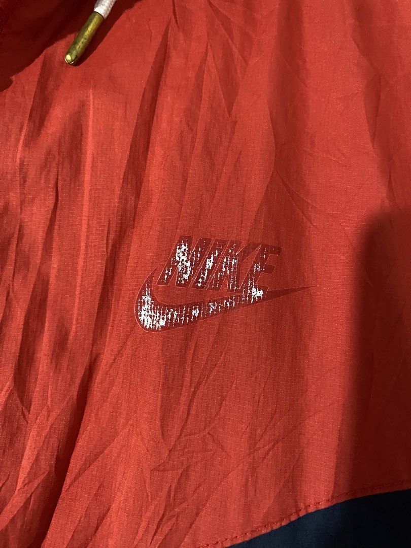 Nike Windbreaker Hoodie (Category: Coats, Jackets and Outerwear) located in Rosales. Submitted by 2goodforsecond (Listing ID 1422825722, Image 3). Description: 25 Width 28 Length Issue 1 small pinhole missing main puller but working zipper both pockets not working but can be fix. 9/10 Color rate 8/10 condition..