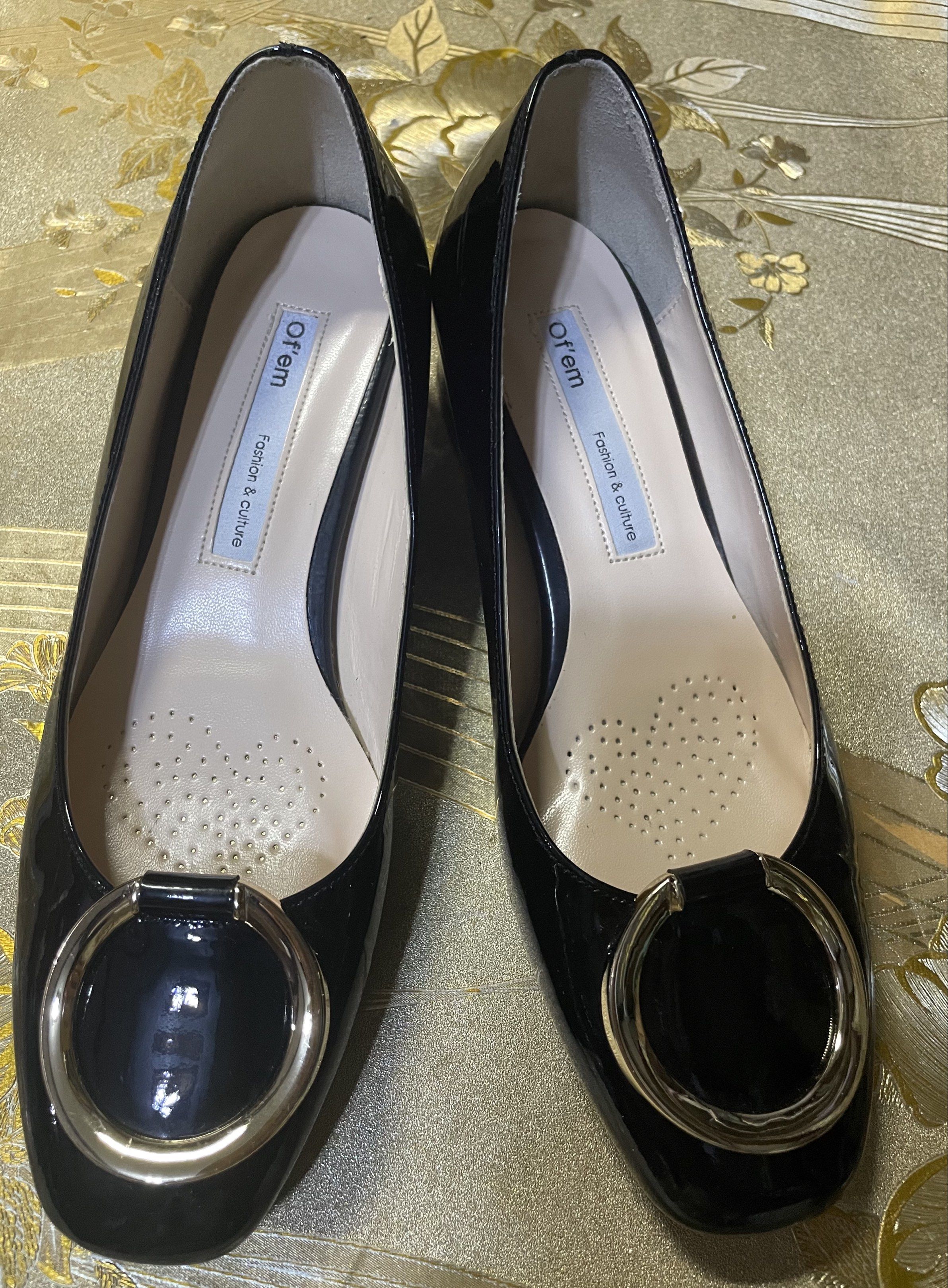 O'fem Black Heels (Category: Heels) located in Manila. Submitted by klebpreloved (Listing ID 1422882824, Image 2). Description: - Black heels, two pairs available. - Pair 1: Features gold ring detail. - Pair 2: Pointed toe with decorative embellishments. - Both pairs have a glossy finish. - Perfect for various occasions..