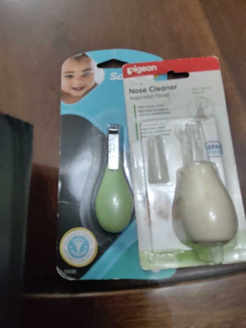 Pigeon Nose Cleaner Aspirator (Category: Baby Toiletries & Grooming) located in Quezon City. Submitted by gcnt_trift_store (Listing ID 1422744027, Image 1). Description: - Brand new and sealed Pigeon Nose Cleaner Aspirator - Includes aspirator and spare tip - Designed for babies - BPA-free - Color: Green and White.