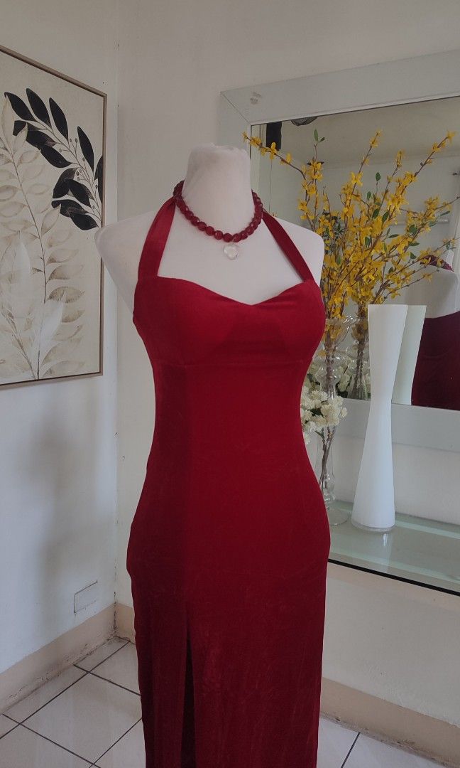 Red Halter Neck Dress with Slit (Category: Dresses) located in Navotas City. Submitted by ivyyy21 (Listing ID 1422813282, Image 3). Description: - Elegant red halter neck dress - Features a flattering sweetheart neckline - Stylish thigh-high slit - Comes with a matching red beaded necklace - Ideal for special occasions and nights out.