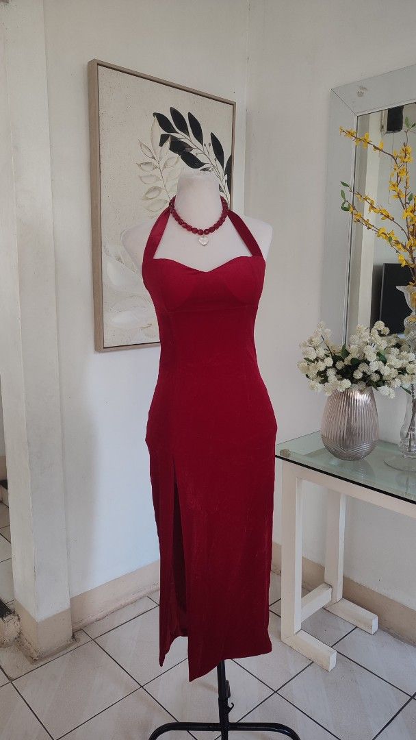 Red Halter Neck Dress with Slit (Category: Dresses) located in Navotas City. Submitted by ivyyy21 (Listing ID 1422813282, Image 1). Description: - Elegant red halter neck dress - Features a flattering sweetheart neckline - Stylish thigh-high slit - Comes with a matching red beaded necklace - Ideal for special occasions and nights out.