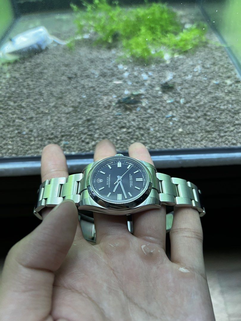 Rolex Oyster Perpetual 36 116000 black dial 2019 *RARE* (Category: Watches) located in Singapore. Submitted by itsyellow (Listing ID 1422852370, Image 2). Description: Full set 2019, no dings or dents, normal signs of use. Rare black dial, only produced between 2018-2020. Cheapest, and very competitively priced..