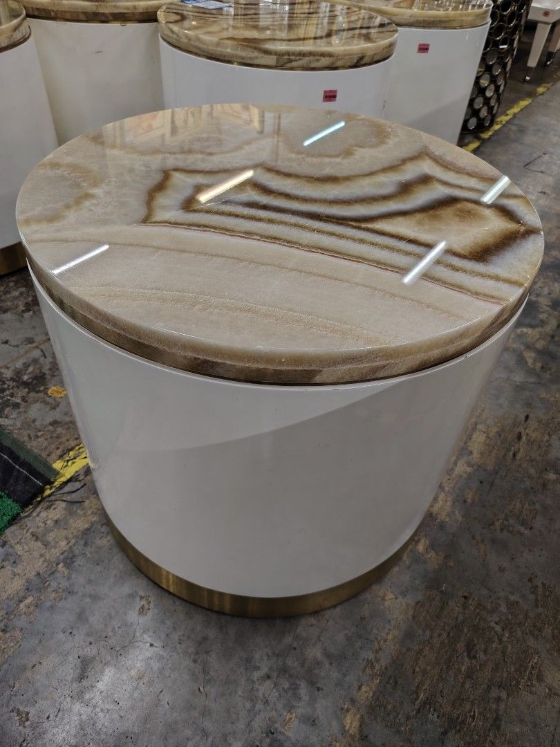 Round Side Table with Marble Top (Category: Tables & Sets) located in Manila. Submitted by rollysuela09206 (Listing ID 1422719927, Image 3). Description: - Round side table Marble Top - Marble top with unique veining - Glossy white body - Gold-colored base - Modern and stylish design - Sturdy and well-crafted - Ideal for living room or bedroom - 24x21" size - As is used minor damage - Call or Text 09757387803.