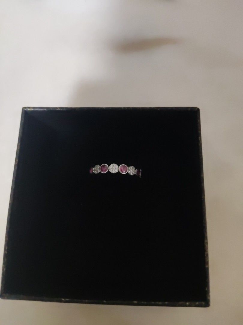 Ruby and Diamond Ring (Category: Rings) located in Singapore. Submitted by jadehome88 (Listing ID 1422903562, Image 1). Description: - Elegant ring with ruby and diamond stones. - Adds a touch of sparkle to any outfit. - Comes in a black box..