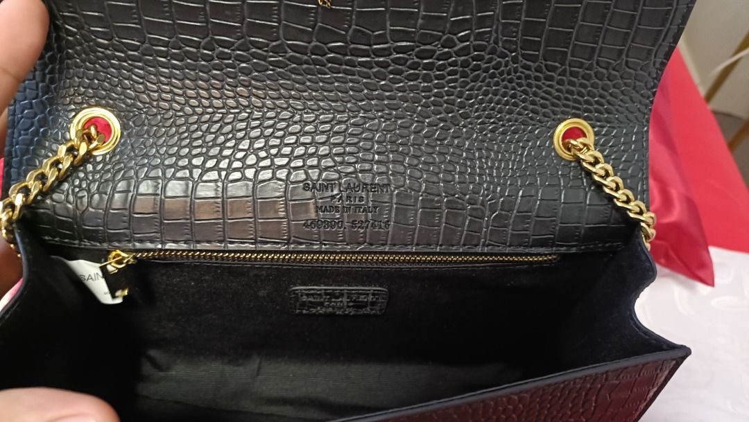 Saint Laurent Black Crocodile-Embossed Chain Bag (Category: Luxury Bags & Wallets) located in Cebu City. Submitted by erlacoleccion (Listing ID 1422762482, Image 2). Description: - Saint Laurent Chain Bag - Black, crocodile-embossed finish - Gold-tone YSL logo - Made in Italy - Dimensions: Approx. 28cm (L) x 18cm (H) - Features: Zippered interior pocket, magnetic snap closure.