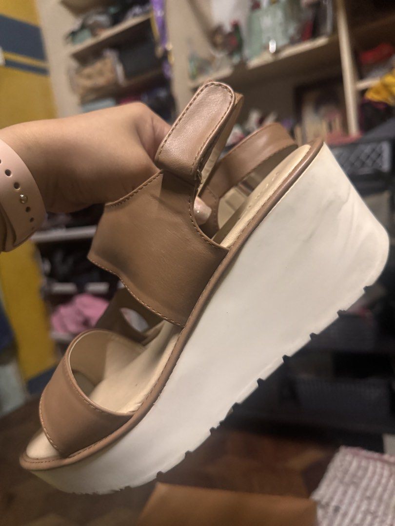 Sally Wedge Sandals - Mustard (Category: Wedges) located in Las Pinas. Submitted by declutterverse (Listing ID 1422870415, Image 1). Description: - Mustard-colored Sally wedge sandals - Brown leather upper - White wedge sole (needs whitening on the back part) - Adjustable strap for secure fit - Size: US 8 / EUR 38.5.