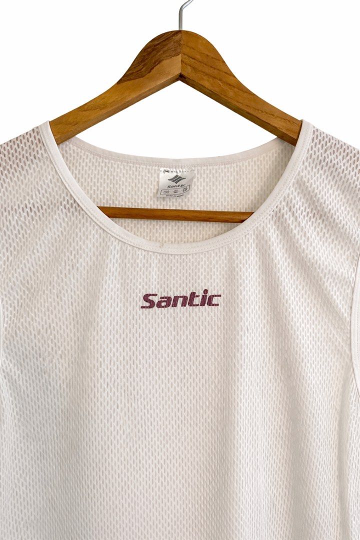 Santic cycling mesh undershirt (Category: Activewear) located in Manila. Submitted by tiongry (Listing ID 1422745241, Image 2). Description: - Santic white mesh tank top - Round neckline - Sleeveless design - Black Santic logo on front - Breathable mesh material - Suitable for cycling.