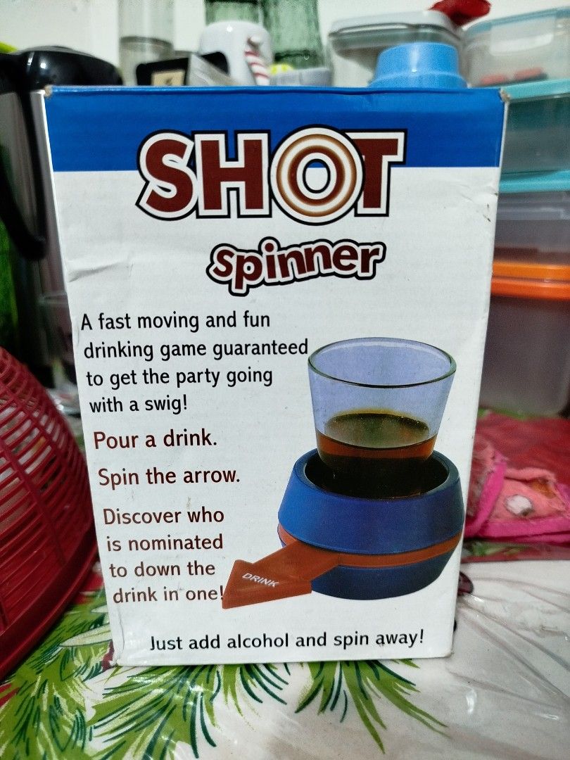 Shot Spinner Drinking Game (Category: Board Games & Puzzles) located in Manila. Submitted by anjiegadgets (Listing ID 1422803756, Image 1). Description: - Shot Spinner drinking game for instant fun! - Spin the arrow to determine who takes the shot. - Includes spinner base and shot glass. - Easy to play: just add your favorite drink! - Perfect for parties and gatherings..