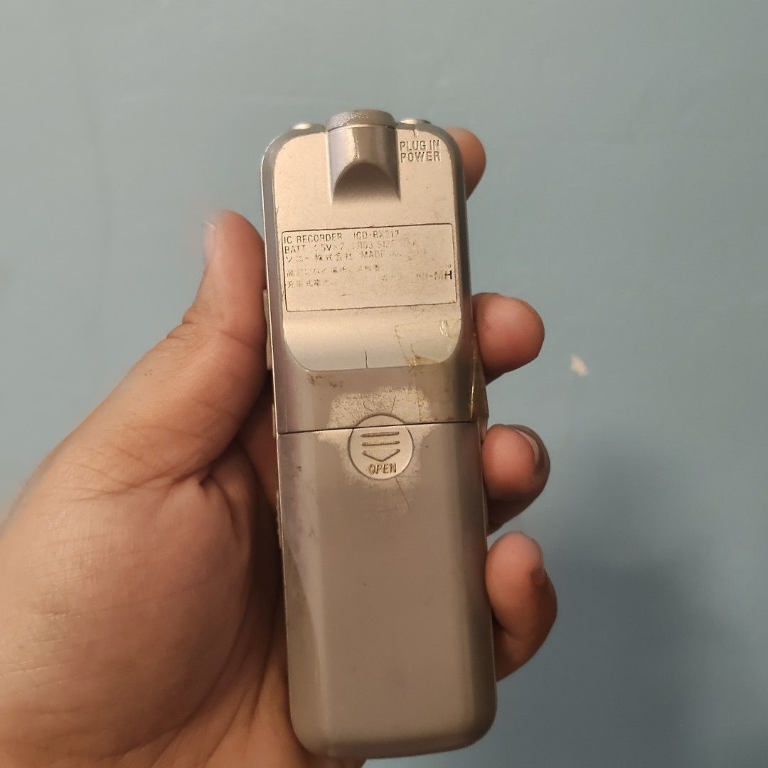Sony IC Recorder (Category: Voice Recorders) located in Catbalogan. Submitted by jpnsrpls (Listing ID 1422891932, Image 3). Description: - Sony IC Recorder - Features a screen - Includes playback, stop, and record buttons - Volume controls on the side - 'Plug in Power' port and 'Open' indicator on the back - Color: Silver and Black.
