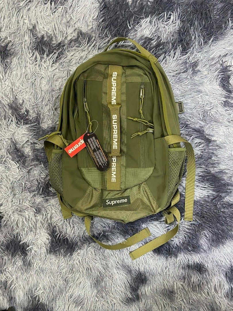 Supreme Backpack (Category: Backpacks) located in Manila. Submitted by retrogang (Listing ID 1422735621, Image 3). Description: - Supreme backpack - Available colors: Black, Red, Green, Blue, Yellow, Pink - Features: Main compartment, side pockets, adjustable straps - Some with Supreme logo - Some with tags.