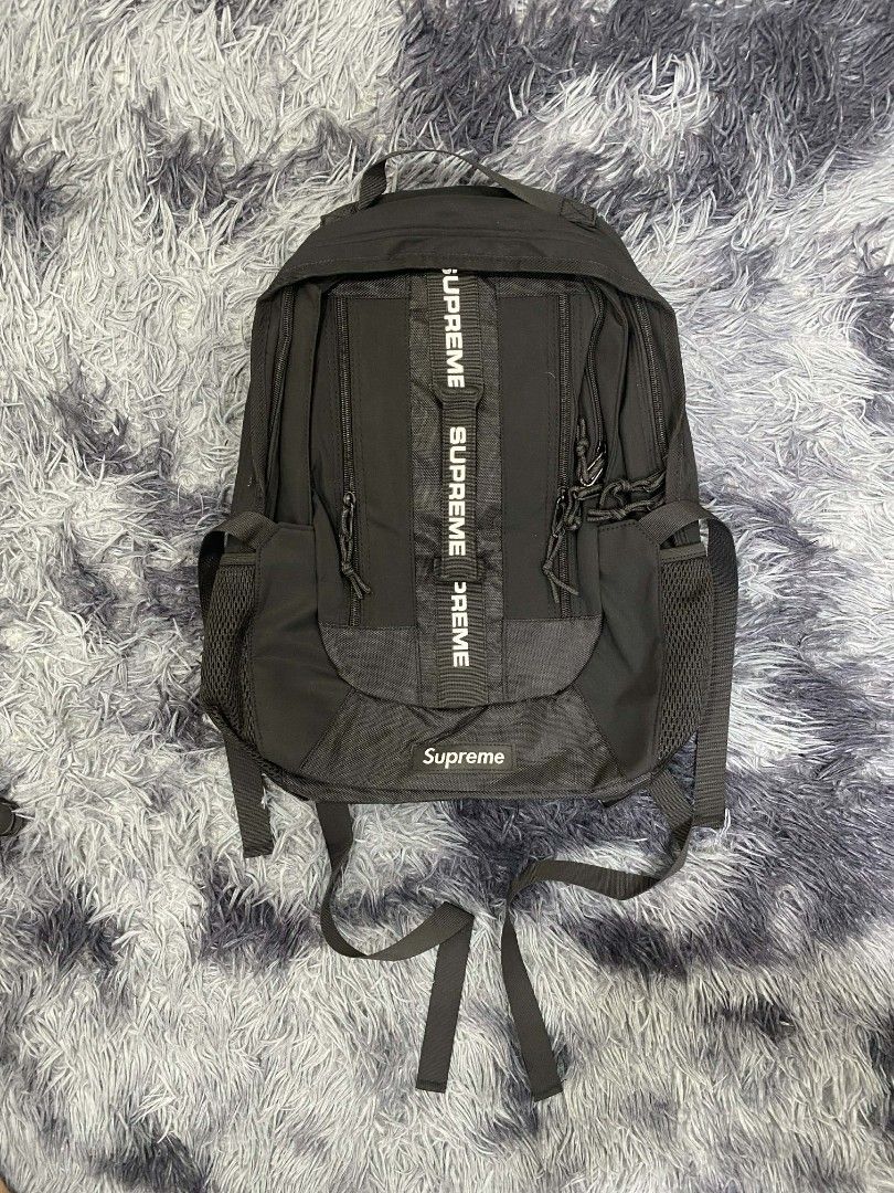 Supreme Backpack (Category: Backpacks) located in Manila. Submitted by retrogang (Listing ID 1422735621, Image 1). Description: - Supreme backpack - Available colors: Black, Red, Green, Blue, Yellow, Pink - Features: Main compartment, side pockets, adjustable straps - Some with Supreme logo - Some with tags.