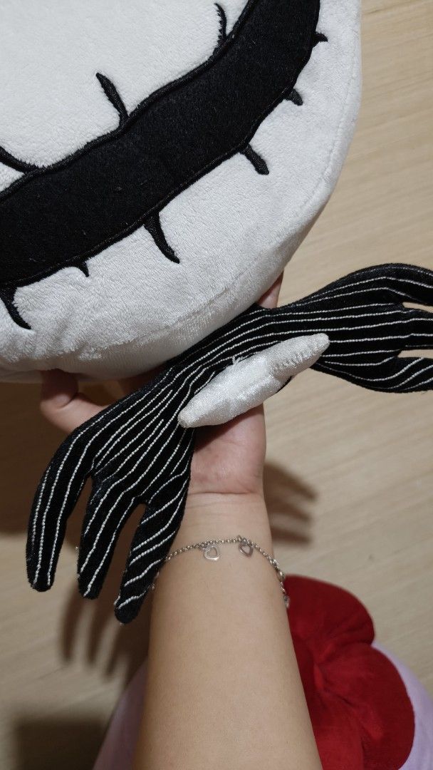 The Nightmare Before Christmas Jack Skellington Plush (Category: Plushies & Soft Toys) located in Tuguegarao City. Submitted by Azzykimee (Listing ID 1422781801, Image 3). Description: - Jack Skellington plush from The Haunted Mansion Holiday Nightmare - Back to Back Face Details - Features a white face with black eyes - Includes a stitched smile - Comes with a black and white striped bow tie and arms - Tagged with "The Haunted Mansion Holiday Ni