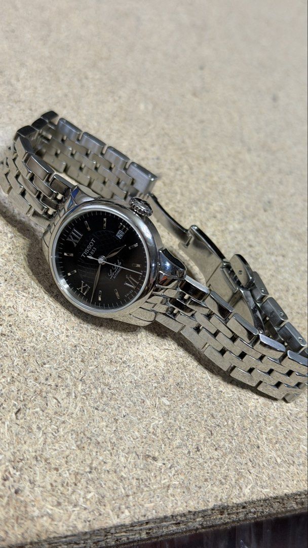 Tissot Le Locle Automatic Watch (Category: Luxury Watches) located in Quezon City. Submitted by abubut.atbp (Listing ID 1422810846, Image 3). Description: Tissot Le Locle Automatic Watch Black dial with Roman numeral hour markers Stainless steel bracelet Date display at 3 o'clock Used once only. It was a gift to a boss of a company. No box. 45k SRP. Location: Valleygolf Antipolo.