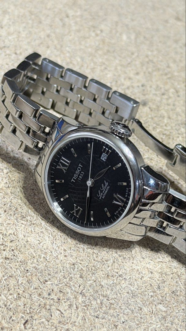 Tissot Le Locle Automatic Watch (Category: Luxury Watches) located in Quezon City. Submitted by abubut.atbp (Listing ID 1422810846, Image 2). Description: Tissot Le Locle Automatic Watch Black dial with Roman numeral hour markers Stainless steel bracelet Date display at 3 o'clock Used once only. It was a gift to a boss of a company. No box. 45k SRP. Location: Valleygolf Antipolo.