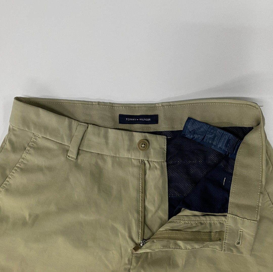 Tommy Hilfiger Khaki Shorts (stretch) (Category: Shorts) located in Bacolod City. Submitted by bt_ph (Listing ID 1422804736, Image 2). Description: - Tommy Hilfiger khaki shorts (stretch) - Size: 29 can fit up to 30 - Length: 16 inches - Closure: Button and zipper - Pockets: Two front, two back - Tommy Hilfiger logo on back pocket - Made in Bangladesh.