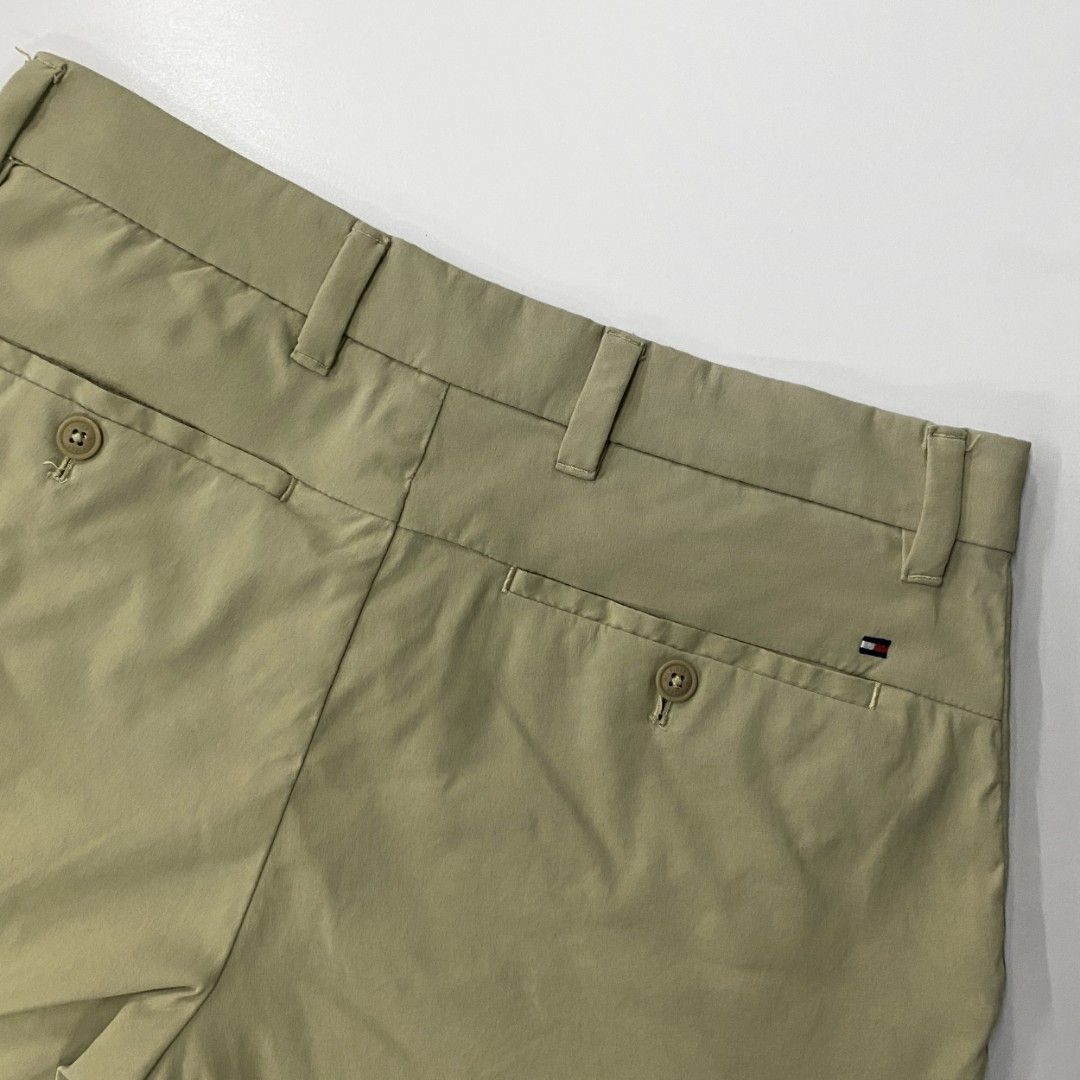 Tommy Hilfiger Khaki Shorts (stretch) (Category: Shorts) located in Bacolod City. Submitted by bt_ph (Listing ID 1422804736, Image 3). Description: - Tommy Hilfiger khaki shorts (stretch) - Size: 29 can fit up to 30 - Length: 16 inches - Closure: Button and zipper - Pockets: Two front, two back - Tommy Hilfiger logo on back pocket - Made in Bangladesh.