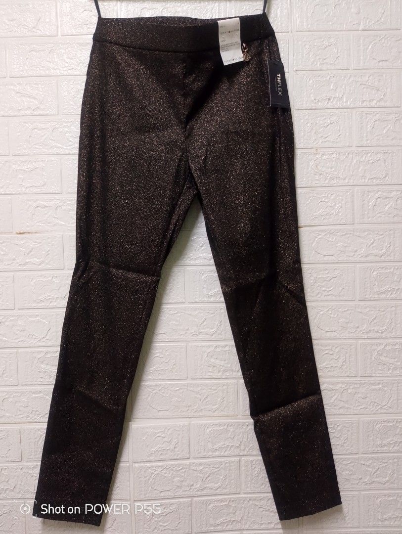Tommy Hilfiger TH Flex Ankle Length Pants (Category: Other Bottoms) located in Binan City. Submitted by stuffshop29 (Listing ID 1422825446, Image 1). Description: - Tommy Hilfiger TH Flex ankle pants - Size 8 - Slim fit - Stretch fabric - Sits below natural waist - Made in Vietnam - Original retail price: $89.00.