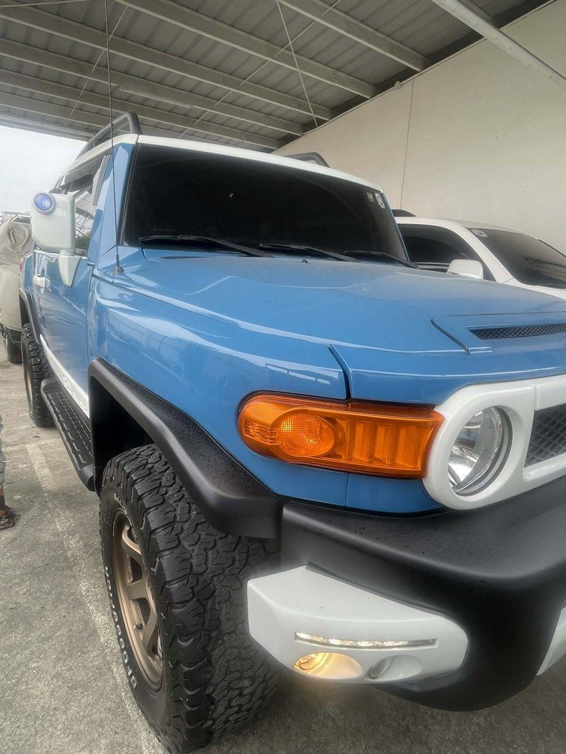 Toyota FJ Cruiser (Category: Used Cars) located in Quezon City. Submitted by sabine23 (Listing ID 1422903121, Image 3). Description: 2016 Toyota FJ Cruiser,Automatic, Color Blue 4x4,gas,16,611 kms mileage 2 inch lift,m(jaos)w/ volk rays mags(bronze),center caps original.