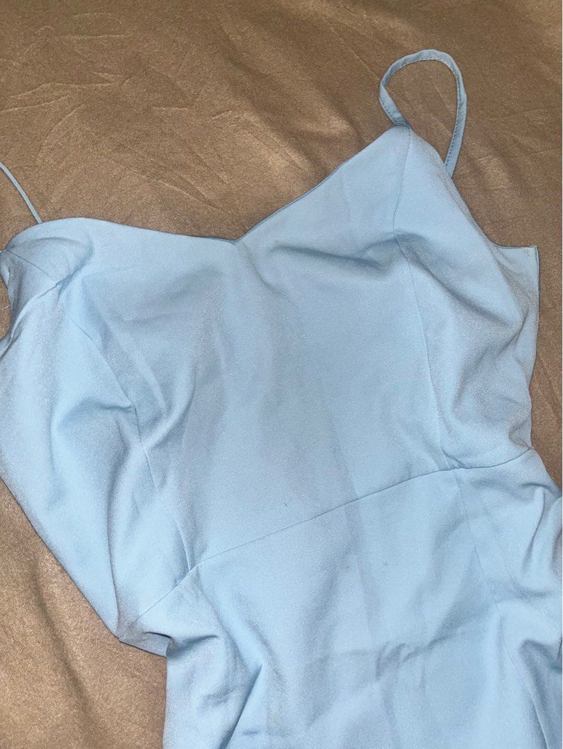 Trendyol Light Blue Dress (Category: Dresses) located in Manila. Submitted by quarishop21 (Listing ID 1422827591, Image 2). Description: - Light blue dress - Adjustable straps - Fitted bodice - Flowing skirt - Smooth fabric - Trendyol brand - Suitable for various occasions.