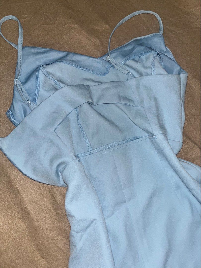 Trendyol Light Blue Dress (Category: Dresses) located in Manila. Submitted by quarishop21 (Listing ID 1422827591, Image 3). Description: - Light blue dress - Adjustable straps - Fitted bodice - Flowing skirt - Smooth fabric - Trendyol brand - Suitable for various occasions.