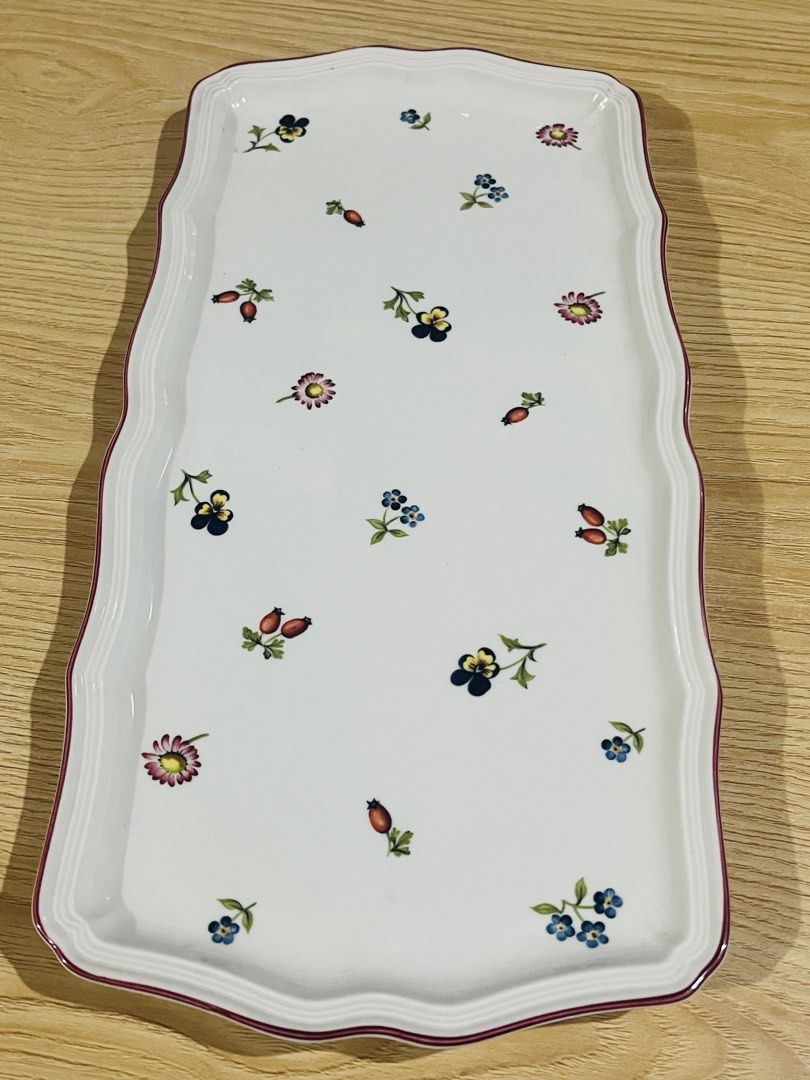 Villeroy & Boch Petite Fleur Serving Tray (Category: Dinnerware & Cutlery) located in Pasig City. Submitted by happydolphin-b943 (Listing ID 1422903529, Image 1). Description: - Villeroy & Boch Petite Fleur serving tray - Elegant floral design - Scalloped edge with maroon trim - Made of durable Vitro-Porcelain - Dishwasher safe - Ideal for serving or display.