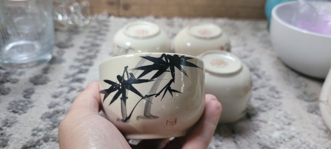 Vintage Bamboo Design Tea Cups (Category: Coffee & Tea Tableware) located in Sablan. Submitted by gongonshelley12 (Listing ID 1422896303, Image 1). Description: 👉👉300 ONLY👈👈 JAPANESE TEA CUPS SET - Set of six vintage teacups - Hand-painted bamboo design on each cup - Unique bamboo illustration on each - Floral pattern on the base of each cup - Cream-colored interior and exterior - Perfect for serving tea or decoration.