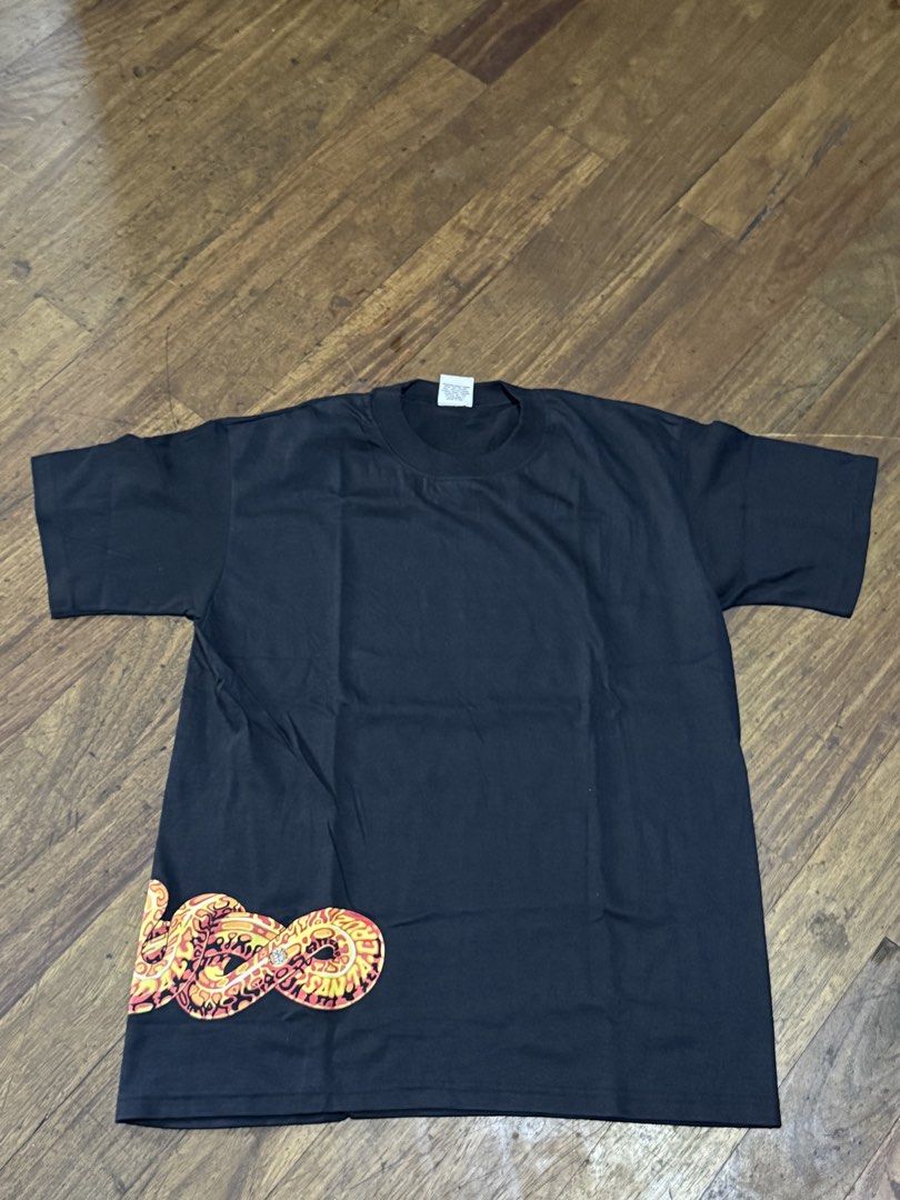 VINTAGE VIBE WRAP AROUND CORRUPT TEE (Category: Tshirts & Polo Shirts ) located in Quezon City. Submitted by 999bodega (Listing ID 1422748952, Image 1). Description: VINTAGE VIBE WRAP AROUND CORRUPT TEE 19x27 NO ISSUW.