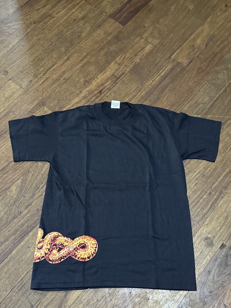 VINTAGE VIBE WRAP AROUND CORRUPT TEE (Category: Tshirts & Polo Shirts ) located in Quezon City. Submitted by 999bodega (Listing ID 1422748952, Image 2). Description: VINTAGE VIBE WRAP AROUND CORRUPT TEE 19x27 NO ISSUW.