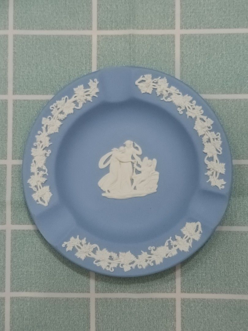 Wedgwood Blue Jasperware Ashtray (Category: Other Home Decor) located in Calamba. Submitted by m_brian (Listing ID 1422860289, Image 1). Description: - Vintage Wedgwood ashtray - Blue jasperware - White bas-relief detailing - Central design - Marked "Wedgwood Made in England" - Includes three cigarette rests - Ideal for collectors or decorative use.