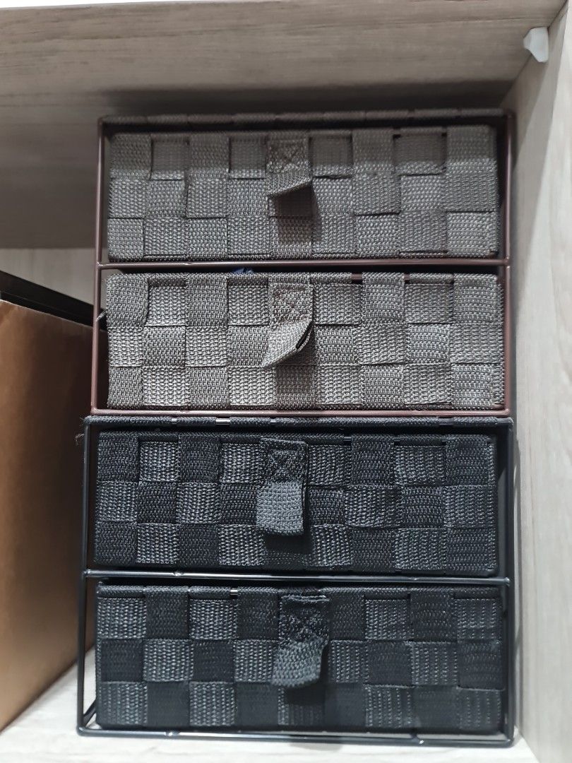 Woven 2 layer drawer black and brown (set) (Category: Storage Boxes & Baskets) located in Bacoor. Submitted by tataandkai (Listing ID 1422723539, Image 1). Description: - Woven 2-layer drawers - Available in black and brown - Features a unique woven design - Perfect for stylish organization brown has sign of storage discoloration. nastore lng sa walkin closet. .
