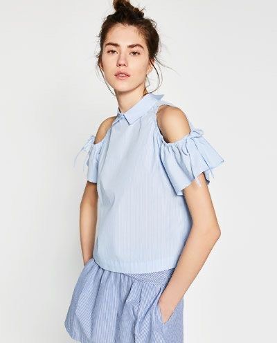 Zara Striped Cold Off Shoulder Top Blouse (Category: Blouses) located in Rodriguez. Submitted by alekshivers (Listing ID 1422869897, Image 2). Description: - Zara striped top - Light blue and white - Collared neckline - Cold shoulder design - Tie details on sleeves - Short sleeves - Slightly gathered waist - Keyhole back detail - Lightweight fabric -xs to small fit.