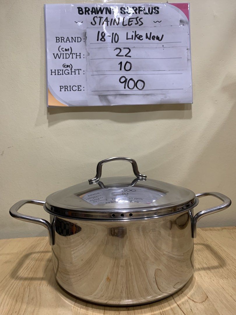 22cm 18-10 Stainless Steel Pot (Category: Cookware & Accessories) located in Cavite. Submitted by rwyanewade39874 (Listing ID 1423070757, Image 1). Description: - Stainless steel pot with lid - Two side handles and a handle on the lid - Shiny, reflective surface - Dimensions: Approximately 22cm width, 10cm height - Like new condition - Price: P900.
