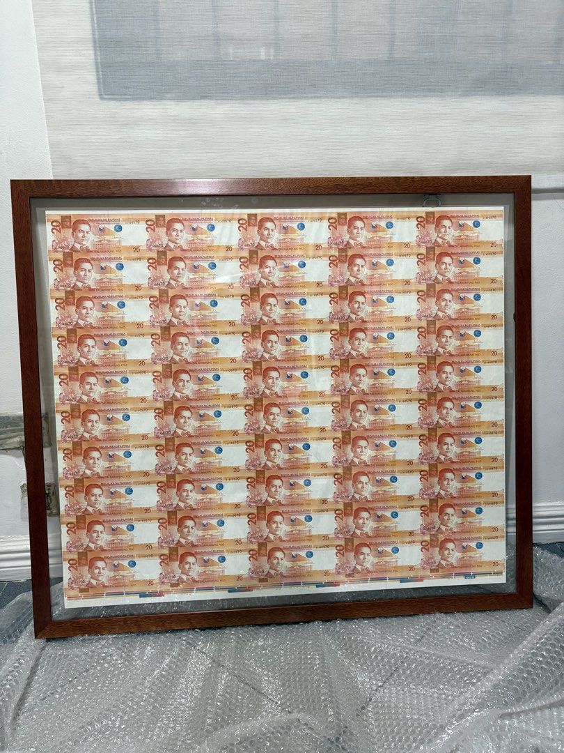 20 Peso Uncut Banknotes (50 pcs) (Category: Currency) located in Mandaluyong City. Submitted by bethankful1805 (Listing ID 1422907043, Image 2). Description: - Framed collection of twenty-peso banknotes. - Wooden frame with glass cover. - Twenty banknotes arranged in a grid. 20 peso uncut 50pcs.