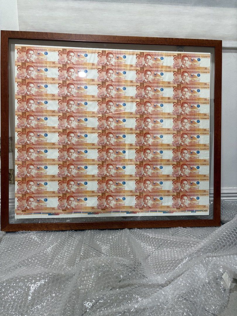 20 Peso Uncut Banknotes (50 pcs) (Category: Currency) located in Mandaluyong City. Submitted by bethankful1805 (Listing ID 1422907043, Image 3). Description: - Framed collection of twenty-peso banknotes. - Wooden frame with glass cover. - Twenty banknotes arranged in a grid. 20 peso uncut 50pcs.