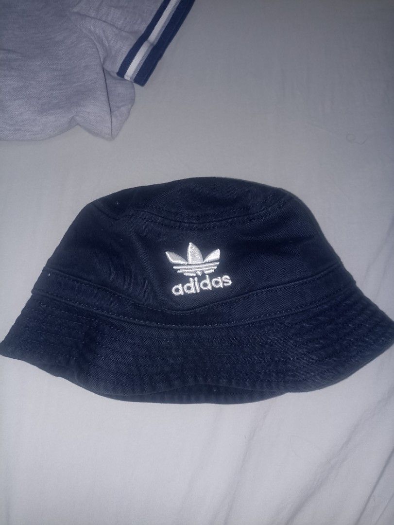 ADIDAS bucket hat (Category: Caps & Hats) located in Manila. Submitted by freespace01 (Listing ID 1422938277, Image 2). Description: never been used just stored after being gifted small size circumference is 22 inches.