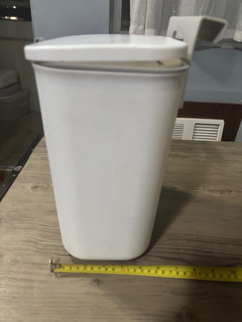 Aesthetic White Hanging Trash Bin (Category: Waste Bins & Bags) located in Mandaluyong City. Submitted by decluttermaven (Listing ID 1422920791, Image 3). Description: AVAILABLE while still posted. Plastic and light-weight. Minimal discolorations, no cracks, very presentable. Will wash and clean thoroughly before sending to you. For measurements, please see pics. Price: Php 200, slightly negotiable Mode of payment: GCASH or BPI bank transfer ONLY