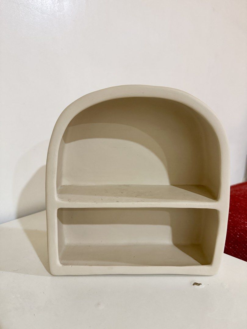 Arch-Shaped Ceramic Shelf (Category: Shelves, Cabinets & Racks) located in Manila. Submitted by declutterkween14 (Listing ID 1422965345, Image 2). Description: - Stylish arch-shaped ceramic shelf - Features two levels - Ideal for cosmetics, accessories, and small decor .