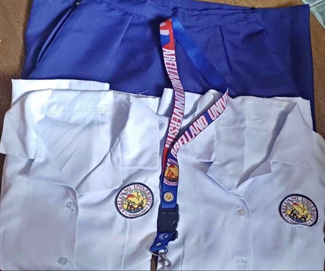 Arellano University Senior High School Uniform (Category: Sets or Coordinates) located in Manila. Submitted by findsby.ann (Listing ID 1422987620, Image 3). Description: - Complete Arellano University Senior High School uniform set - Includes: - White blouse with blue lining and school patch - Peacock blue skirt Fits to S-M Skirt 25 in - 27 in Price still negotiable .