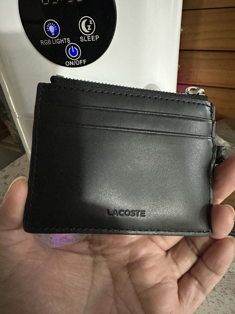 Authentic Lacoste Card case with strap (Category: Luxury Bags & Wallets) located in Malabon City. Submitted by vintagemom (Listing ID 1422966951, Image 2). Description: Guaranteed authentic Bought in store for P4500 No more box and paper bag .