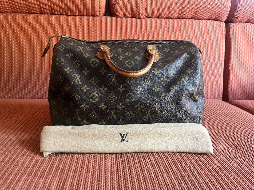Authentic Louis Vuitton Speedy35 handbag (Category: Luxury Bags & Wallets) located in Tacloban City. Submitted by pauuquin (Listing ID 1422940712, Image 1). Description: - INCLUDES SERIAL NUMBER - honey patina on vachetta - 24years old - tarnished on hardwares - with dustbag - personal bag RFS: decluttering. Item is still in a good condition and is 100% authentic. (Bought in Kuwait) Can do lay away. negotiable PM me for more photos. Payment is th