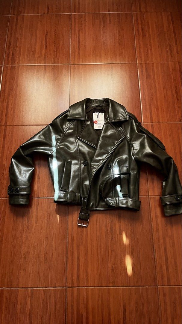 Bershka Faux Leather Jacket XS (Category: Coats, Jackets and Outerwear) located in Kawit. Submitted by cansitcanton (Listing ID 1422960404, Image 1). Description: BRAND NEW WITH TAGS - Bershka faux leather jacket - Size: XS - Color: Black - Design: Double-breasted with belt - Features: Collared neckline - Price Tag: 3595 PHP.
