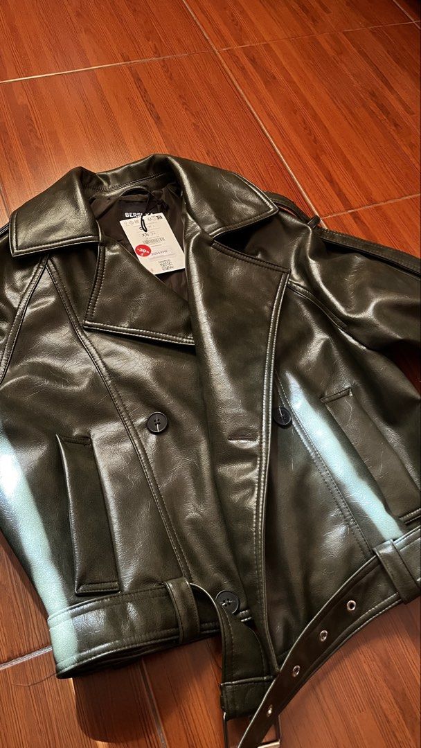 Bershka Faux Leather Jacket XS (Category: Coats, Jackets and Outerwear) located in Kawit. Submitted by cansitcanton (Listing ID 1422960404, Image 2). Description: BRAND NEW WITH TAGS - Bershka faux leather jacket - Size: XS - Color: Black - Design: Double-breasted with belt - Features: Collared neckline - Price Tag: 3595 PHP.