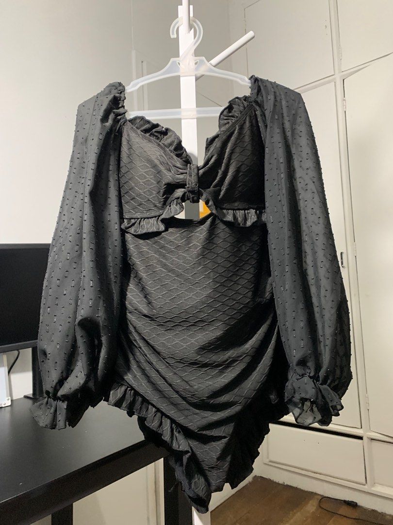 Black Long Sleeve Bodysuit/Swimsuit (Category: Others Tops) located in Quezon City. Submitted by declutterwithm (Listing ID 1423020105, Image 1). Description: - Black long-sleeved bodysuit - Textured fabric - With pads - Tie-up detail at the back - Dotted sleeves - Ruffled cuffs - Ruffled neckline - Ruffled bottom trim - Can be worn as a swimsuit.