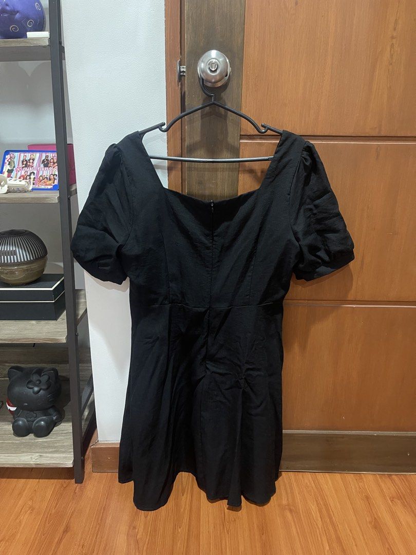 Black Square Neck Dress (Category: Dresses) located in Cainta. Submitted by engelerrrr (Listing ID 1422967726, Image 2). Description: - Black dress - Square neckline - Short puff sleeves - Fitted bodice - Flared skirt - Textured fabric - Back zipper closure - Suitable for casual and semi-formal occasions.