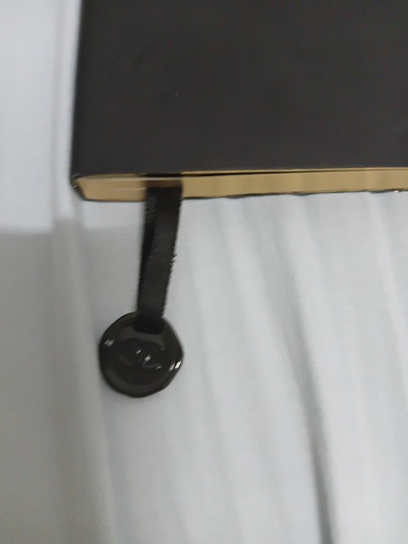 Chanel Beauté Notebook (Category: Luxury Accessories) located in Quezon City. Submitted by threetwotwo2ndaccount (Listing ID 1423038604, Image 2). Description: - Brand new Chanel Beauté notebook - Features an elastic band closure - Includes a ribbon bookmark with a charm - Elegant gold-edged pages - Showcases the iconic Chanel logo - Unused condition no inclusion.