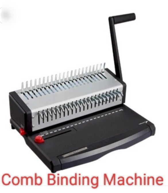 Comb Binding Machine (Category: Office & Business Technology) located in Singapore. Submitted by makeups.20032004 (Listing ID 1422948952, Image 1). Description: - Comb binding machine - Perfect for binding documents, reports, and presentations - Features a handle for easy operation - Includes a paper tray - Suitable for office or home use.