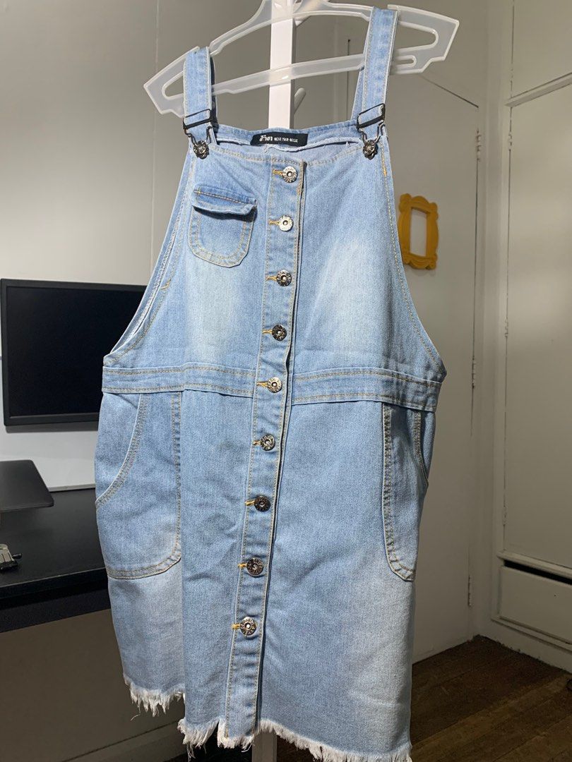 Denim Overall Dress (Category: Jumpsuits) located in Quezon City. Submitted by declutterwithm (Listing ID 1423020803, Image 1). Description: - Light blue denim overall dress - Button-down front - Adjustable straps - Features pockets - Raw hemline - Fits S to M.